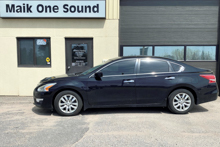 2014 Nissan Altima with computer-cut window tint installation in North Bay